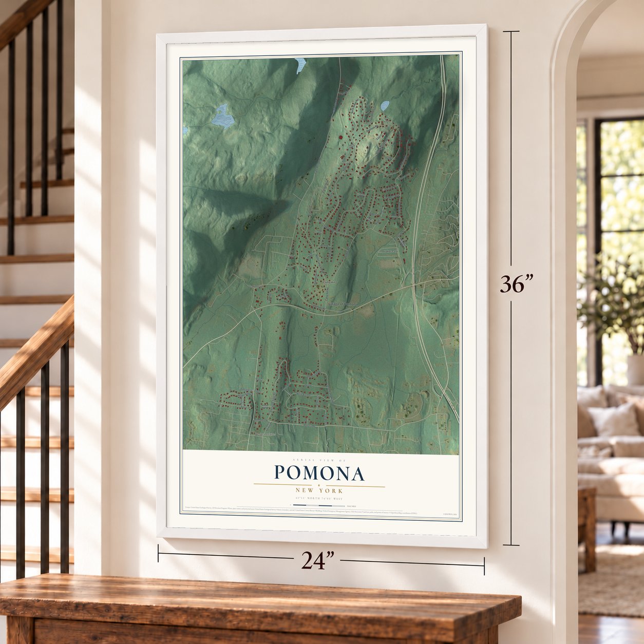 Pomona, New York map, 24 x 36 inch print in a white frame by a staircase