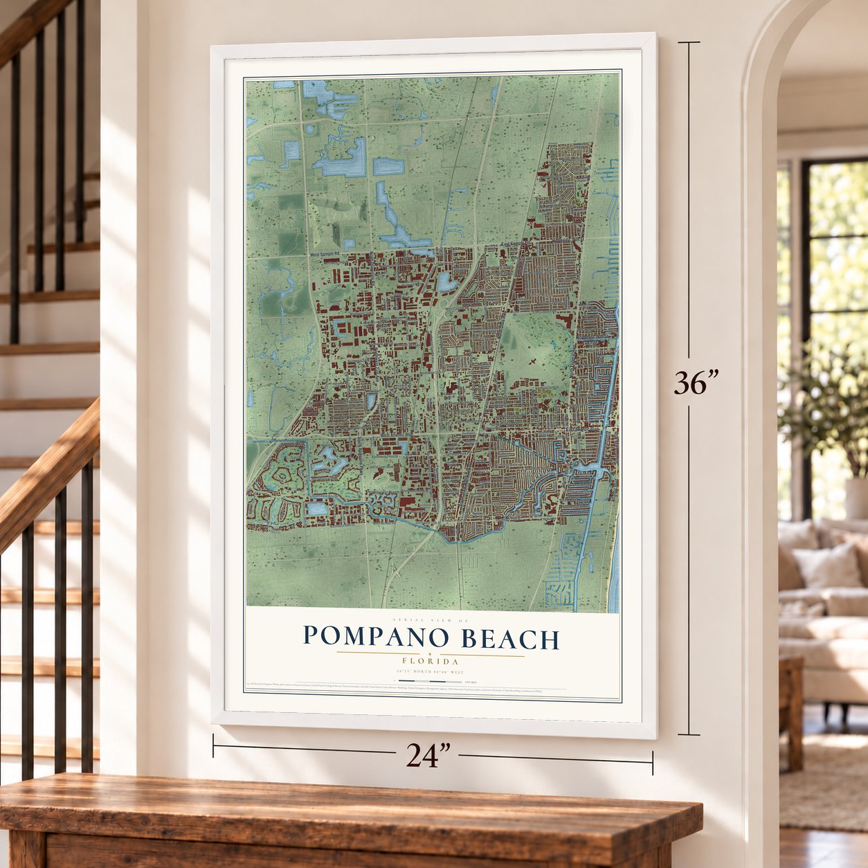 Pompano Beach, Florida map, 24 x 36 inch print in a white frame by a staircase