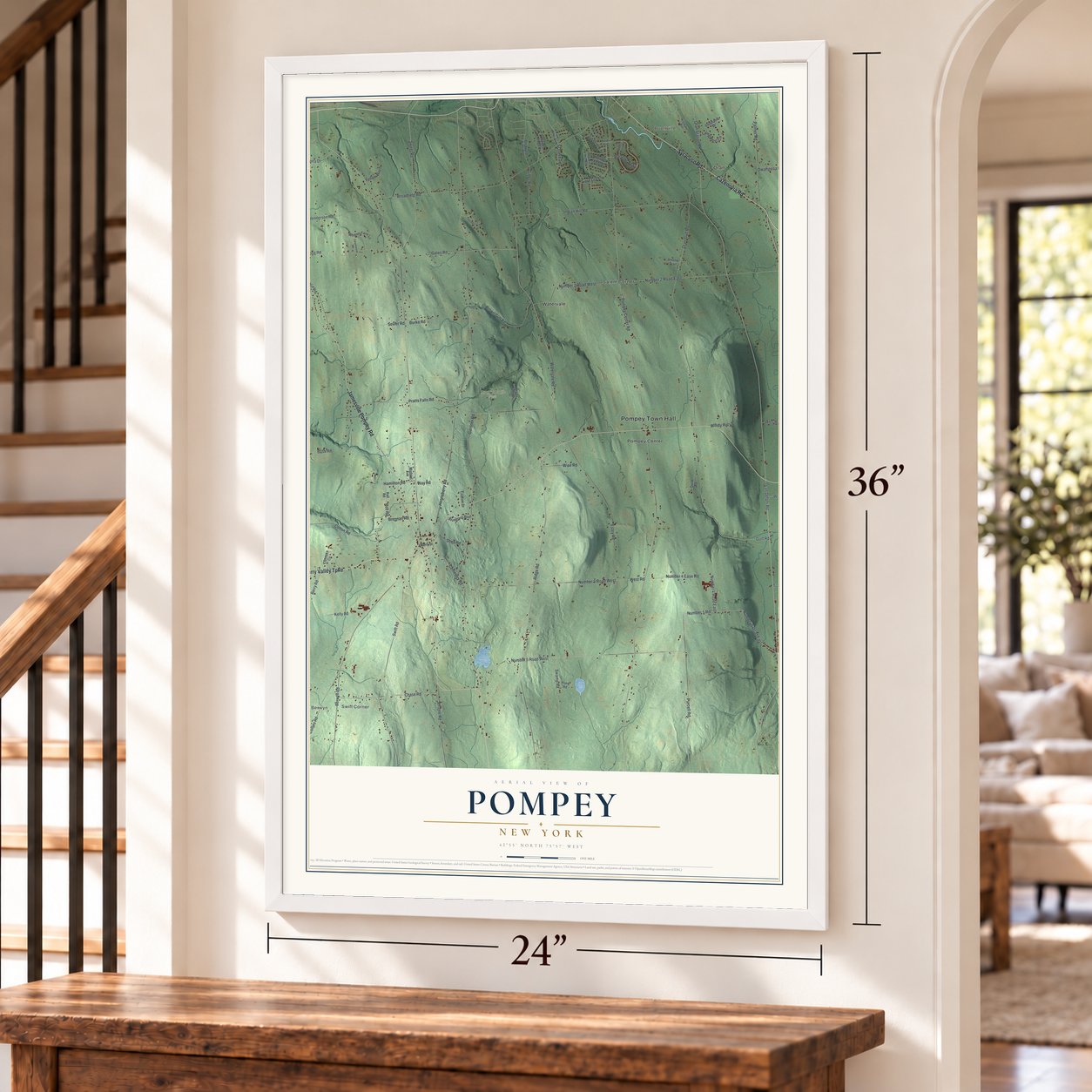 Pompey, New York map, 24 x 36 inch print in a white frame by a staircase