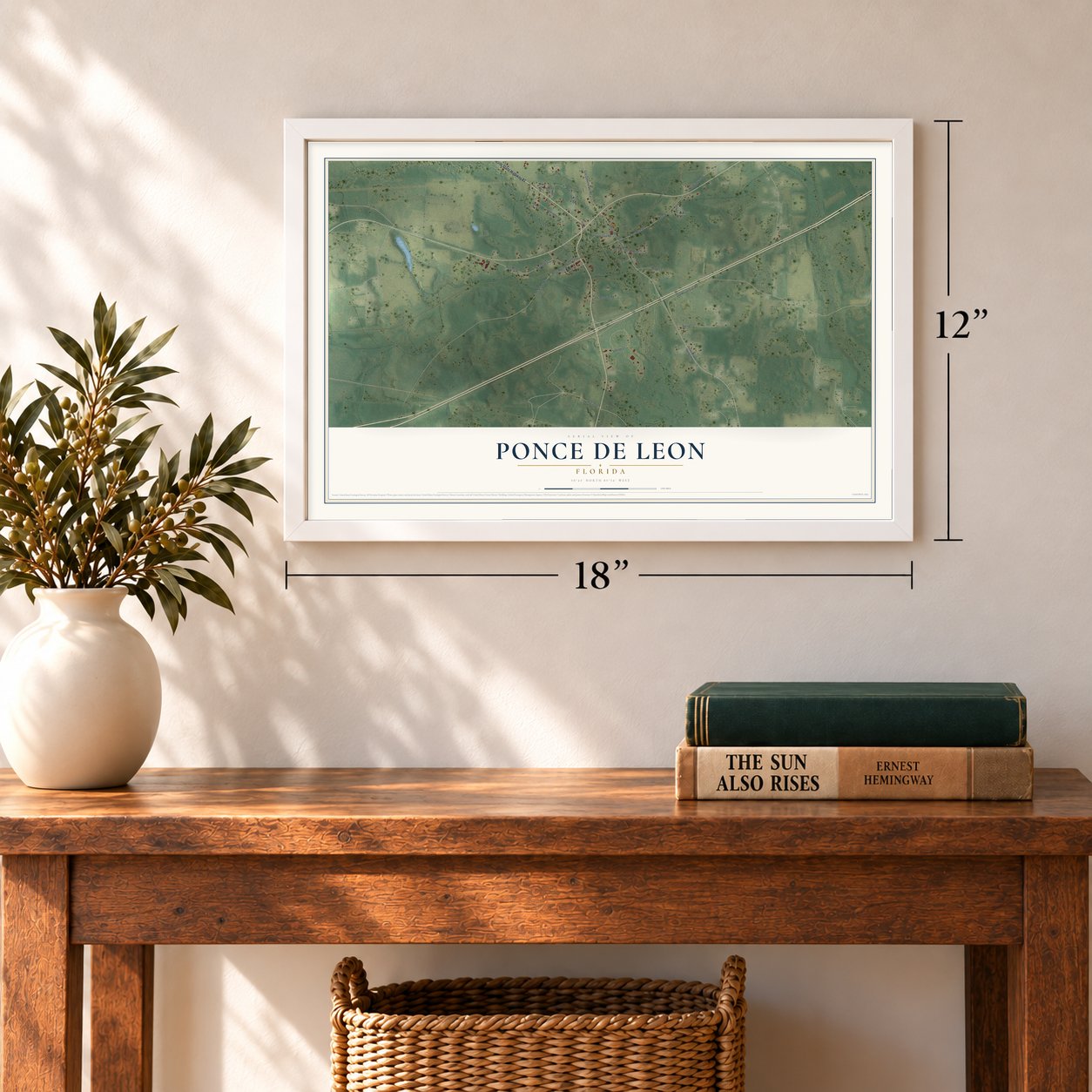 Ponce de Leon, Florida map, 12 x 18 inch print in a white frame in an entryway
