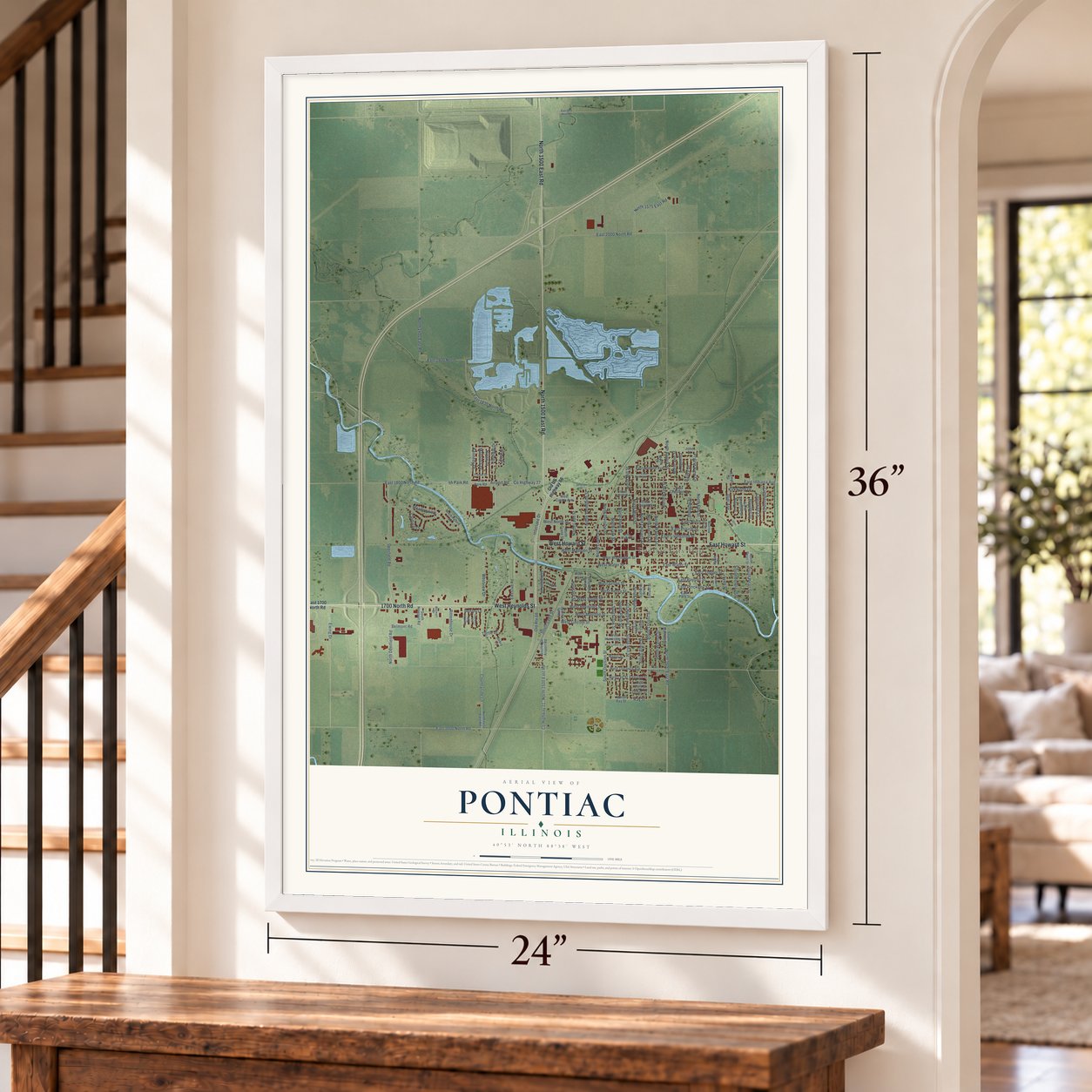 Pontiac, Illinois map, 24 x 36 inch print in a white frame by a staircase