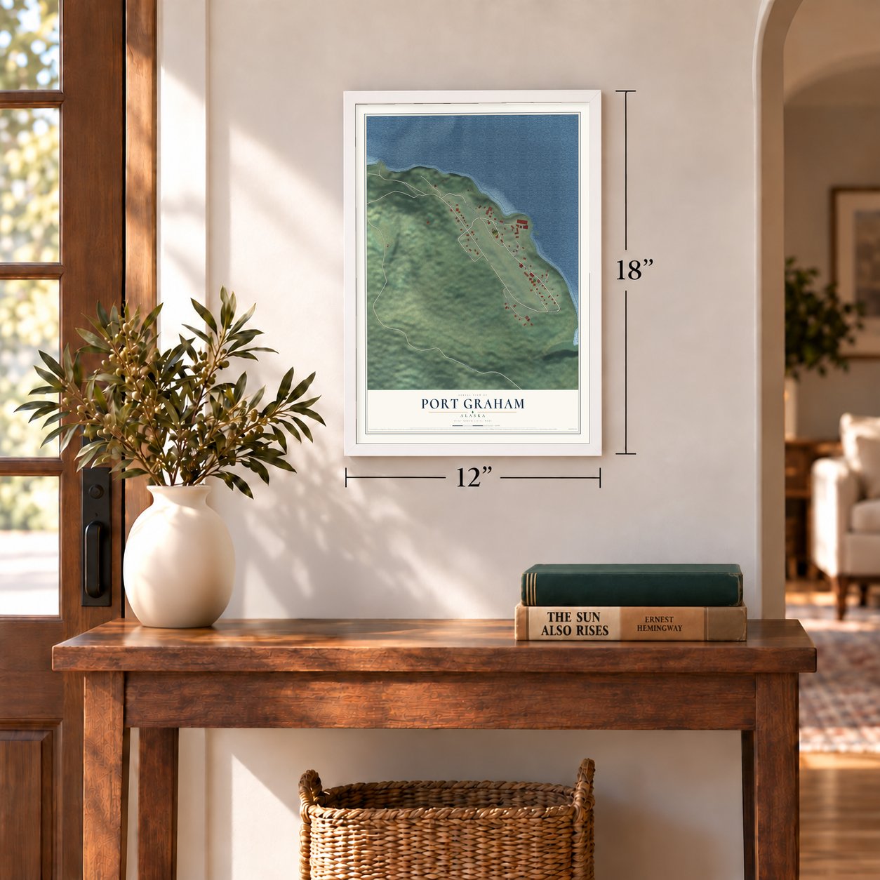 Port Graham, Alaska map, 12 x 18 inch print in a white frame in an entryway