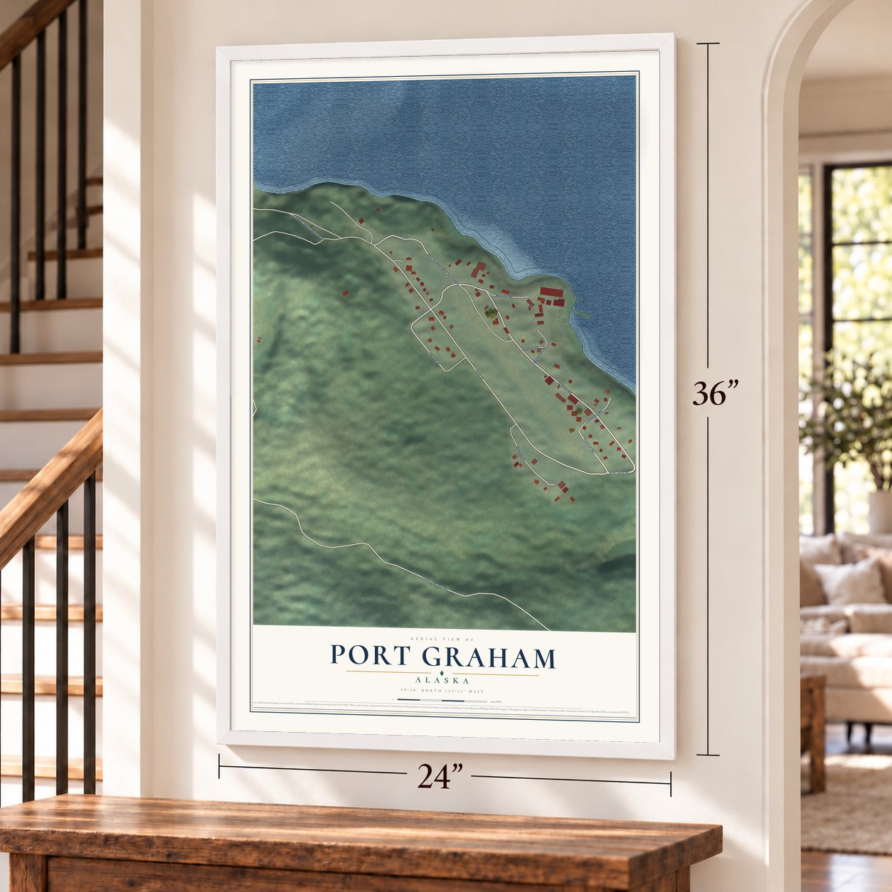 Port Graham, Alaska map, 24 x 36 inch print in a white frame by a staircase