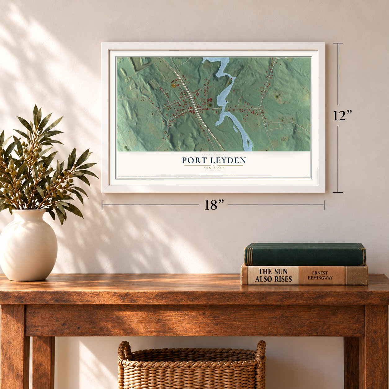 Port Leyden, New York map, 12 x 18 inch print in a white frame in an entryway