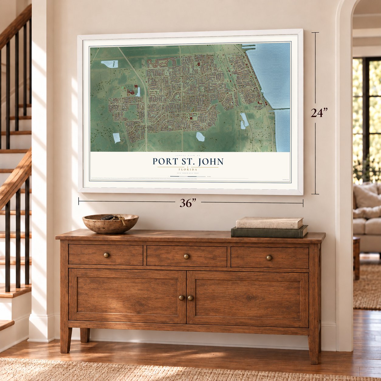 Port St. John, Florida map, 24 x 36 inch print in a white frame above a dresser by a staircase