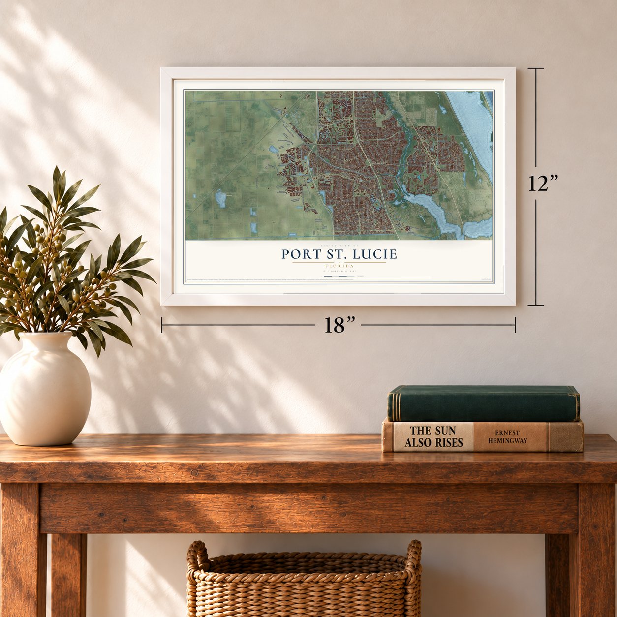Port St. Lucie, Florida map, 12 x 18 inch print in a white frame in an entryway