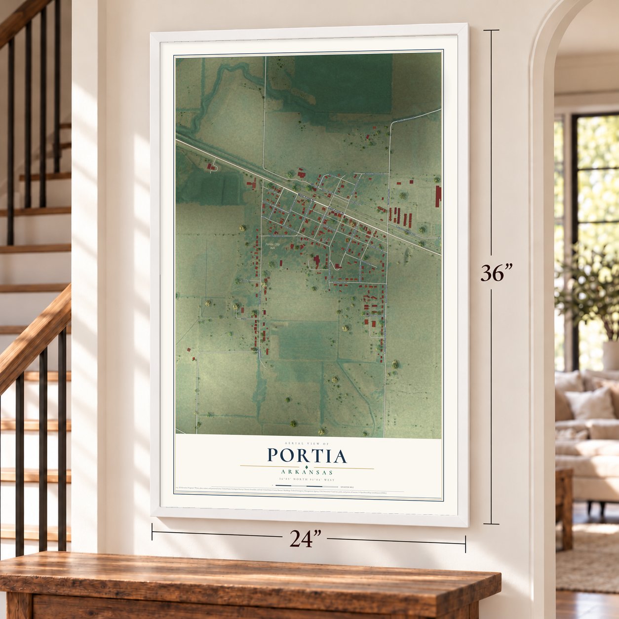 Portia, Arkansas map, 24 x 36 inch print in a white frame by a staircase