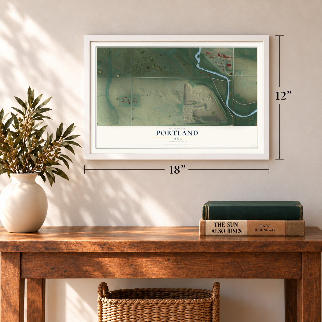 Portland, Iowa map, 12 x 18 inch print in a white frame in an entryway