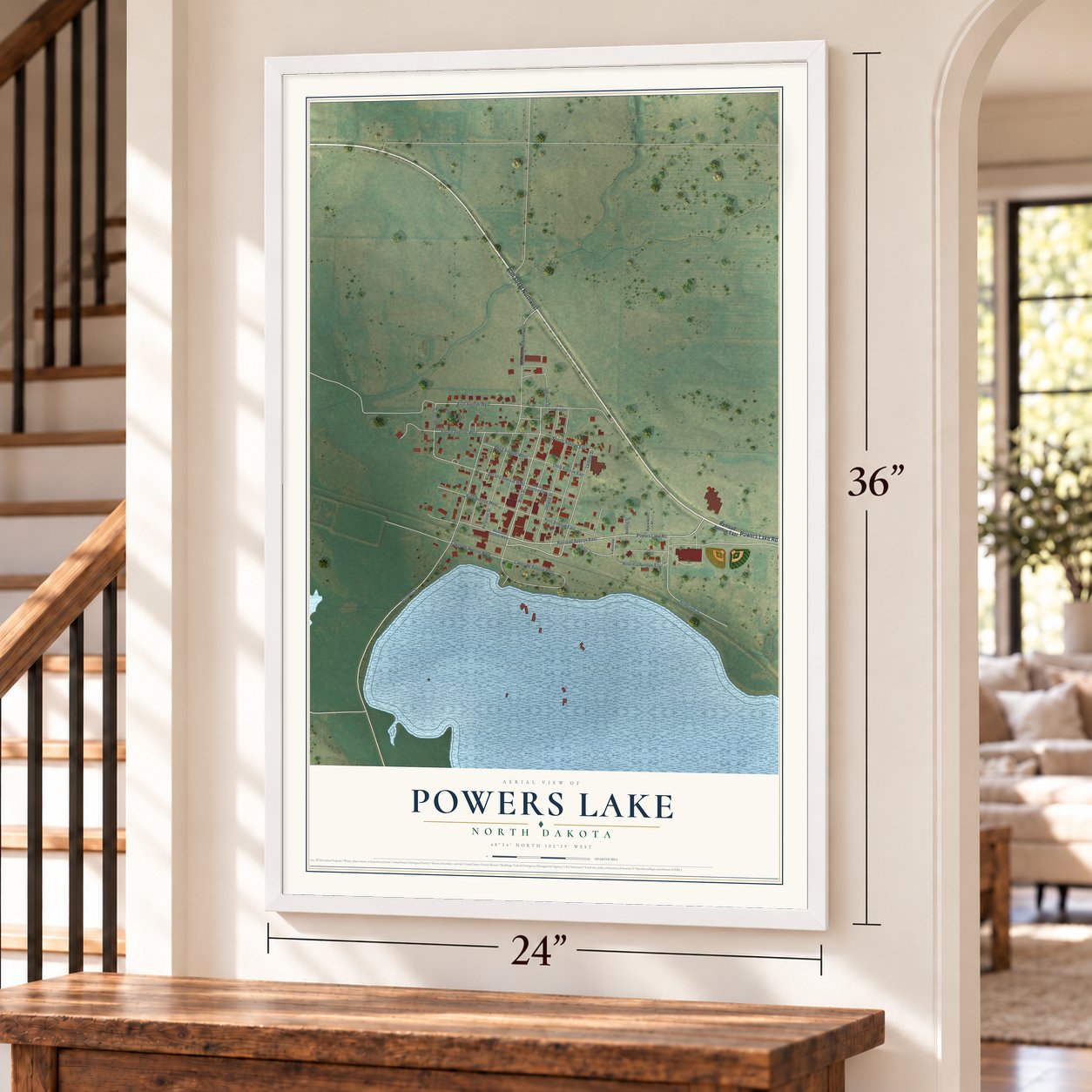 Powers Lake, North Dakota map, 24 x 36 inch print in a white frame by a staircase