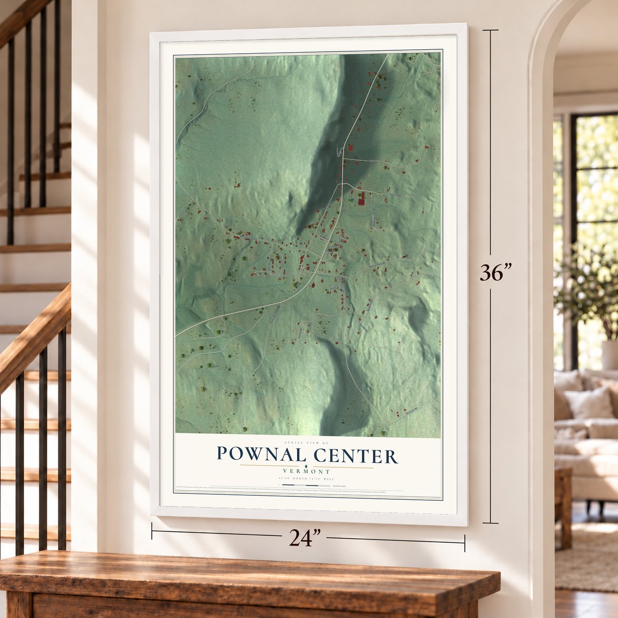 Pownal Center, Vermont map, 24 x 36 inch print in a white frame by a staircase