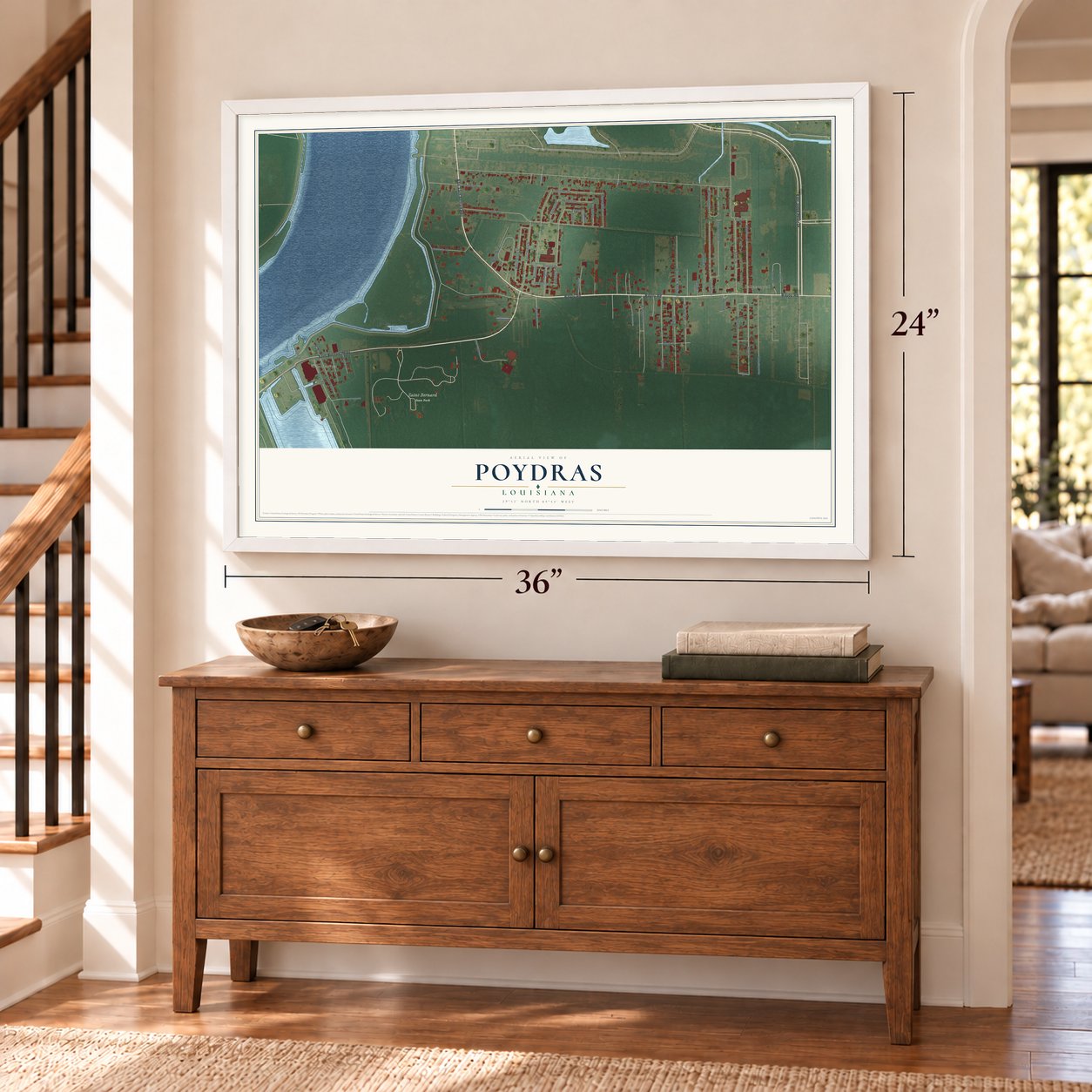 Poydras, Louisiana map, 24 x 36 inch print in a white frame above a dresser by a staircase