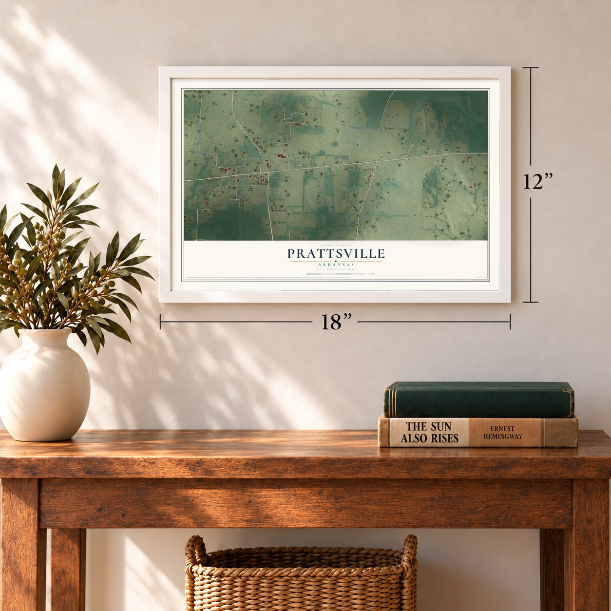 Prattsville, Arkansas map, 12 x 18 inch print in a white frame in an entryway