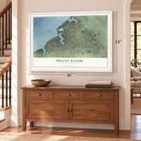 Pretty Bayou, Florida map, 24 x 36 inch print in a white frame above a dresser by a staircase