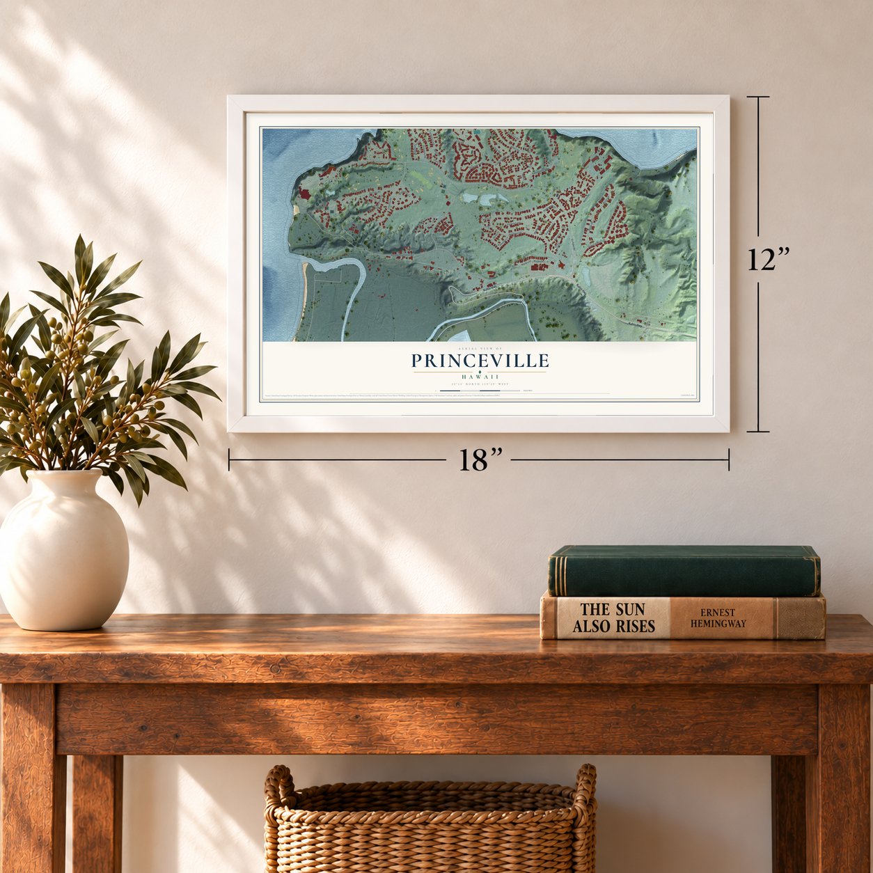 Princeville, Hawaii map, 12 x 18 inch print in a white frame in an entryway