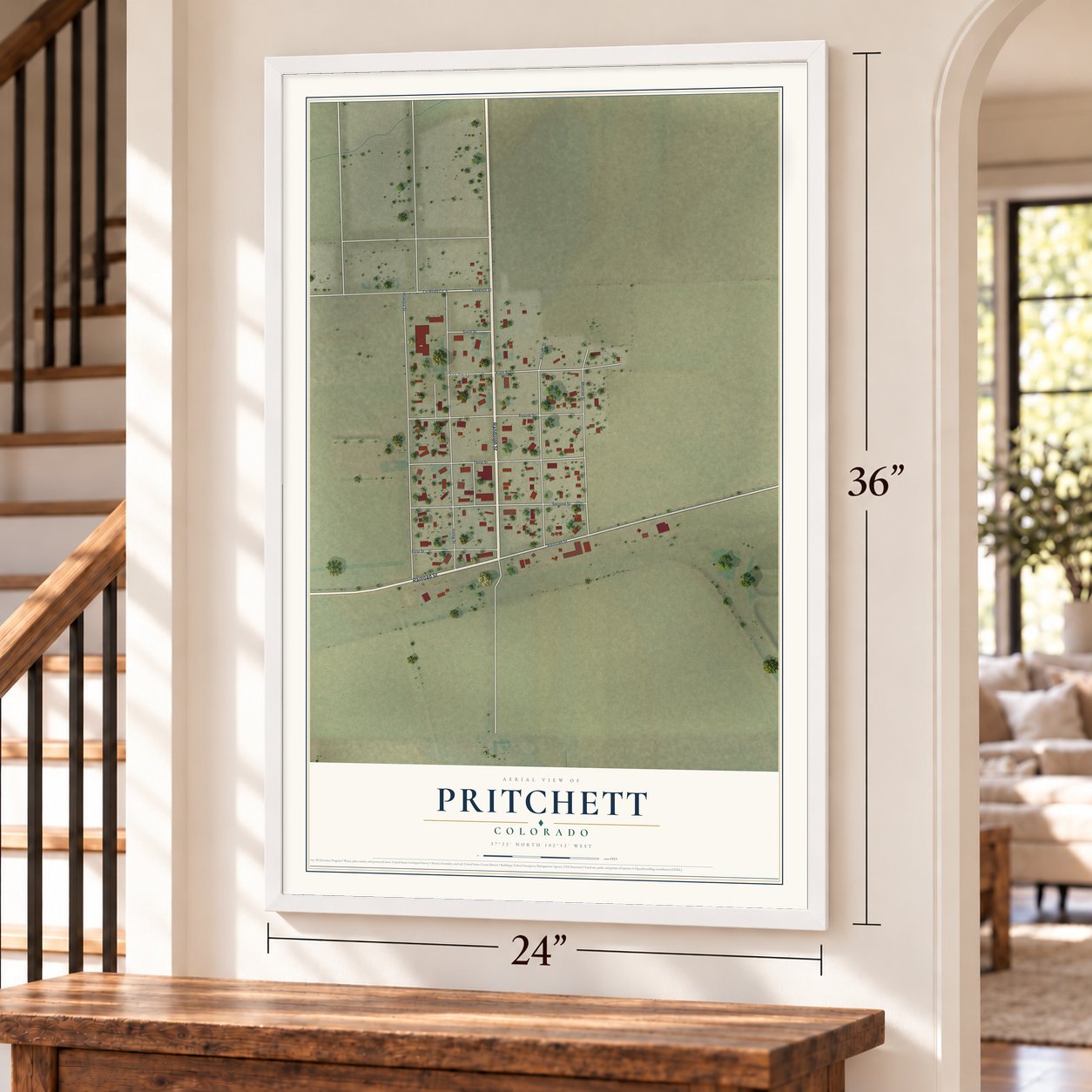 Pritchett, Colorado map, 24 x 36 inch print in a white frame by a staircase