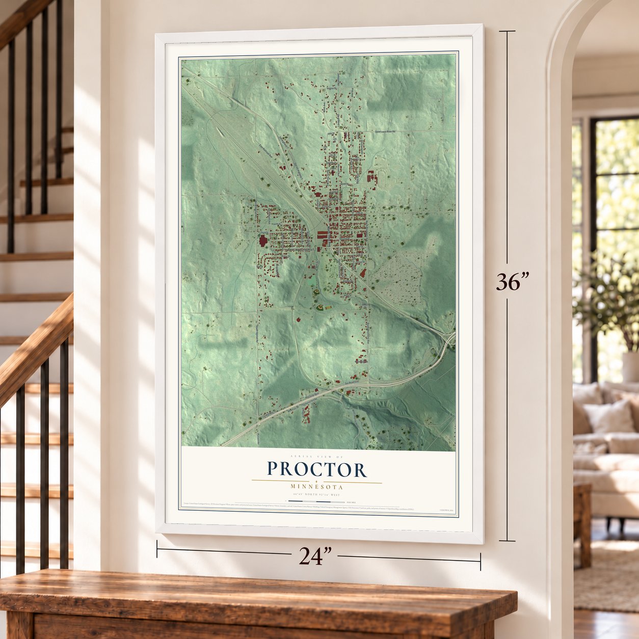 Proctor, Minnesota map, 24 x 36 inch print in a white frame by a staircase