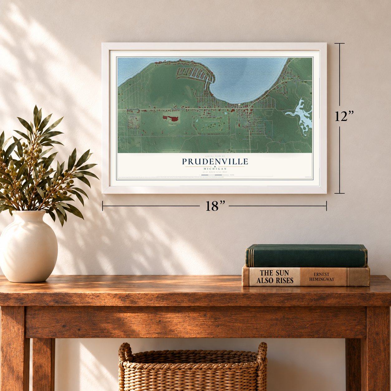 Prudenville, Michigan map, 12 x 18 inch print in a white frame in an entryway