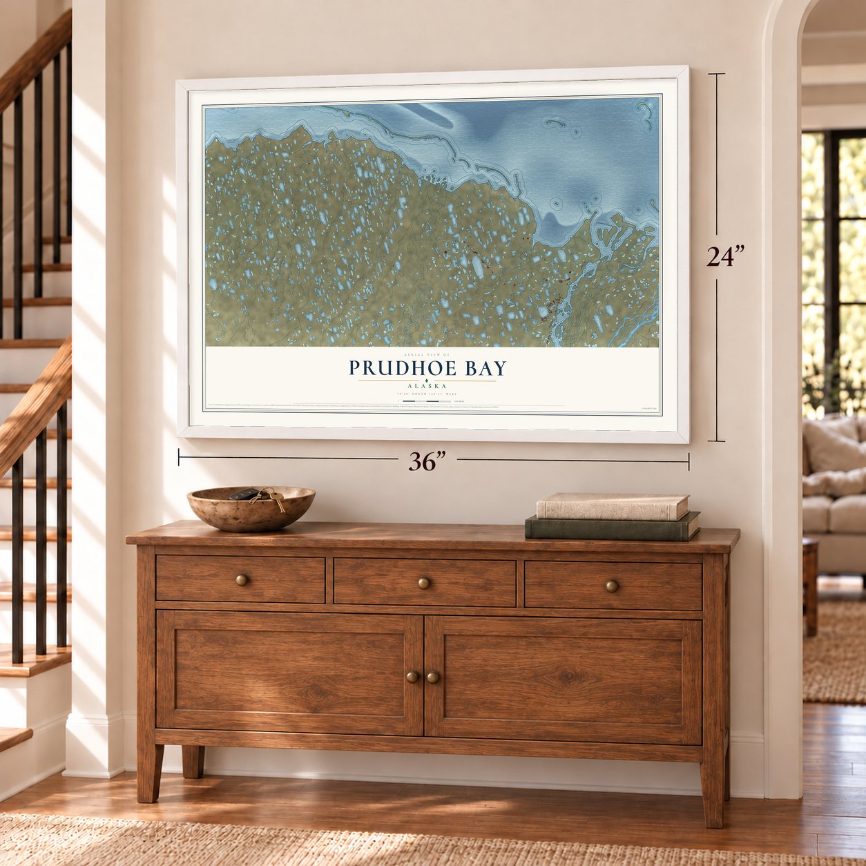 Prudhoe Bay, Alaska map, 24 x 36 inch print in a white frame above a dresser by a staircase