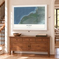Puako, Hawaii map, 24 x 36 inch print in a white frame above a dresser by a staircase
