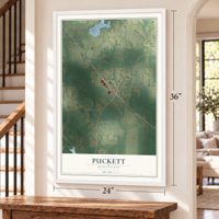 Puckett, Mississippi map, 24 x 36 inch print in a white frame by a staircase