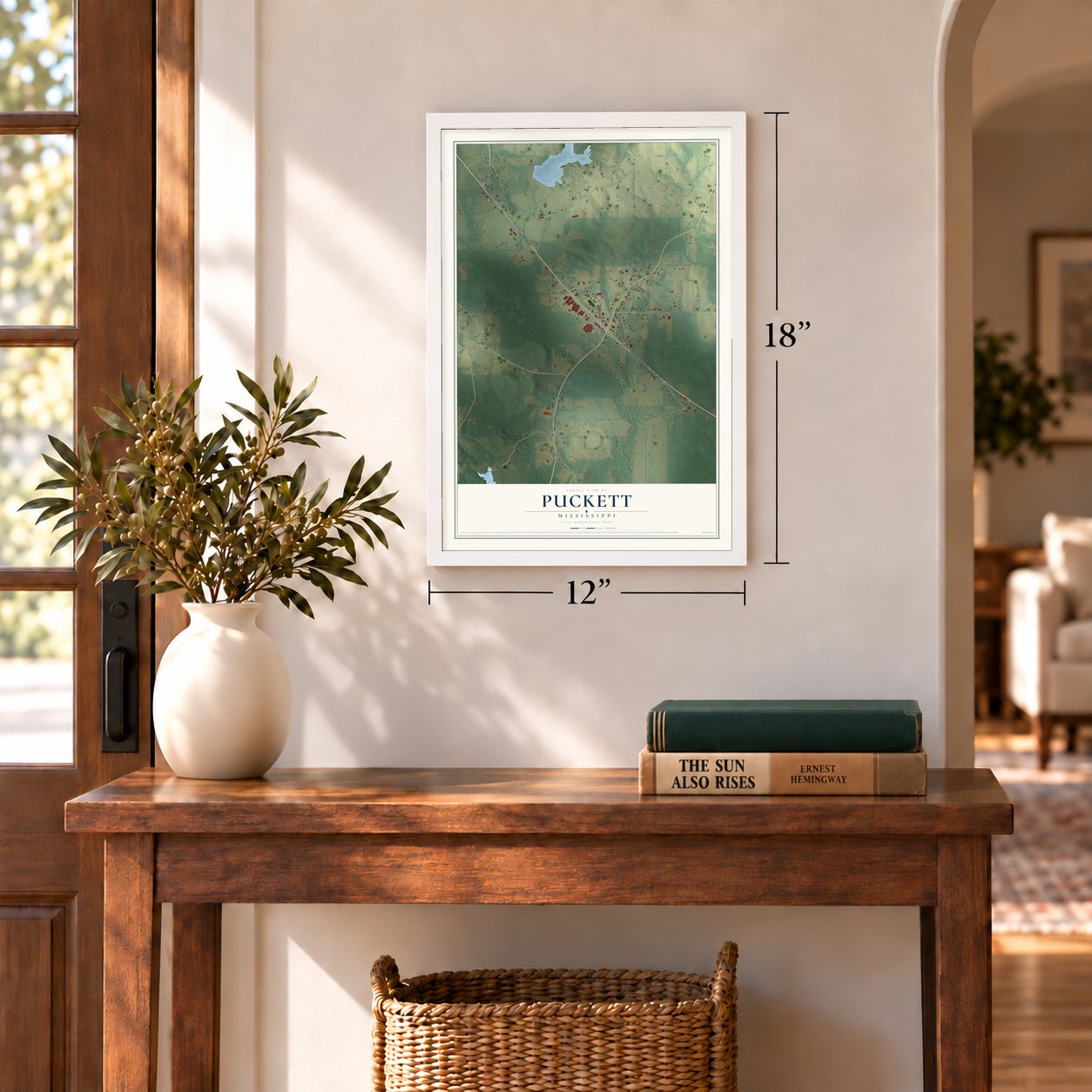 Puckett, Mississippi map, 12 x 18 inch print in a white frame in an entryway
