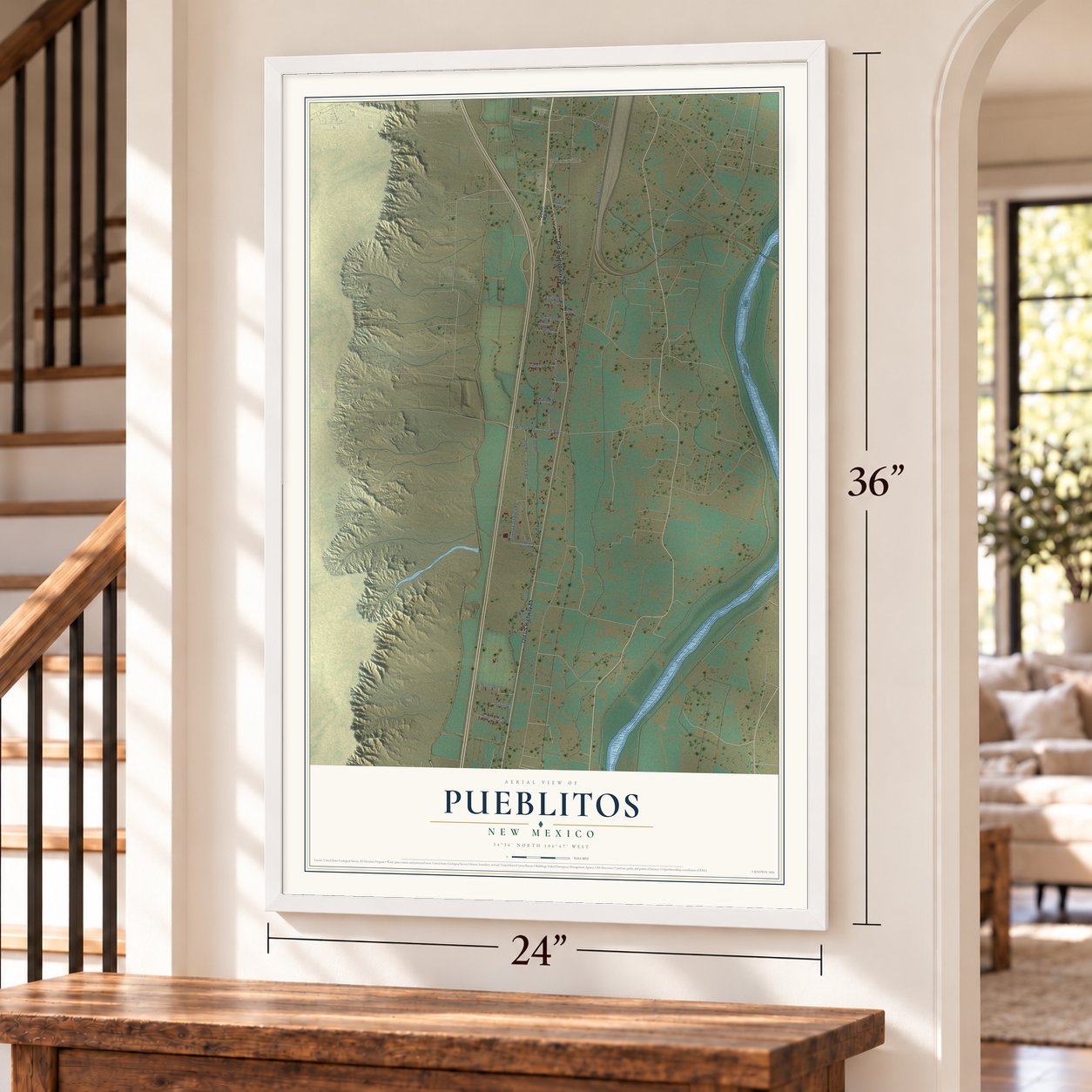 Pueblitos, New Mexico map, 24 x 36 inch print in a white frame by a staircase