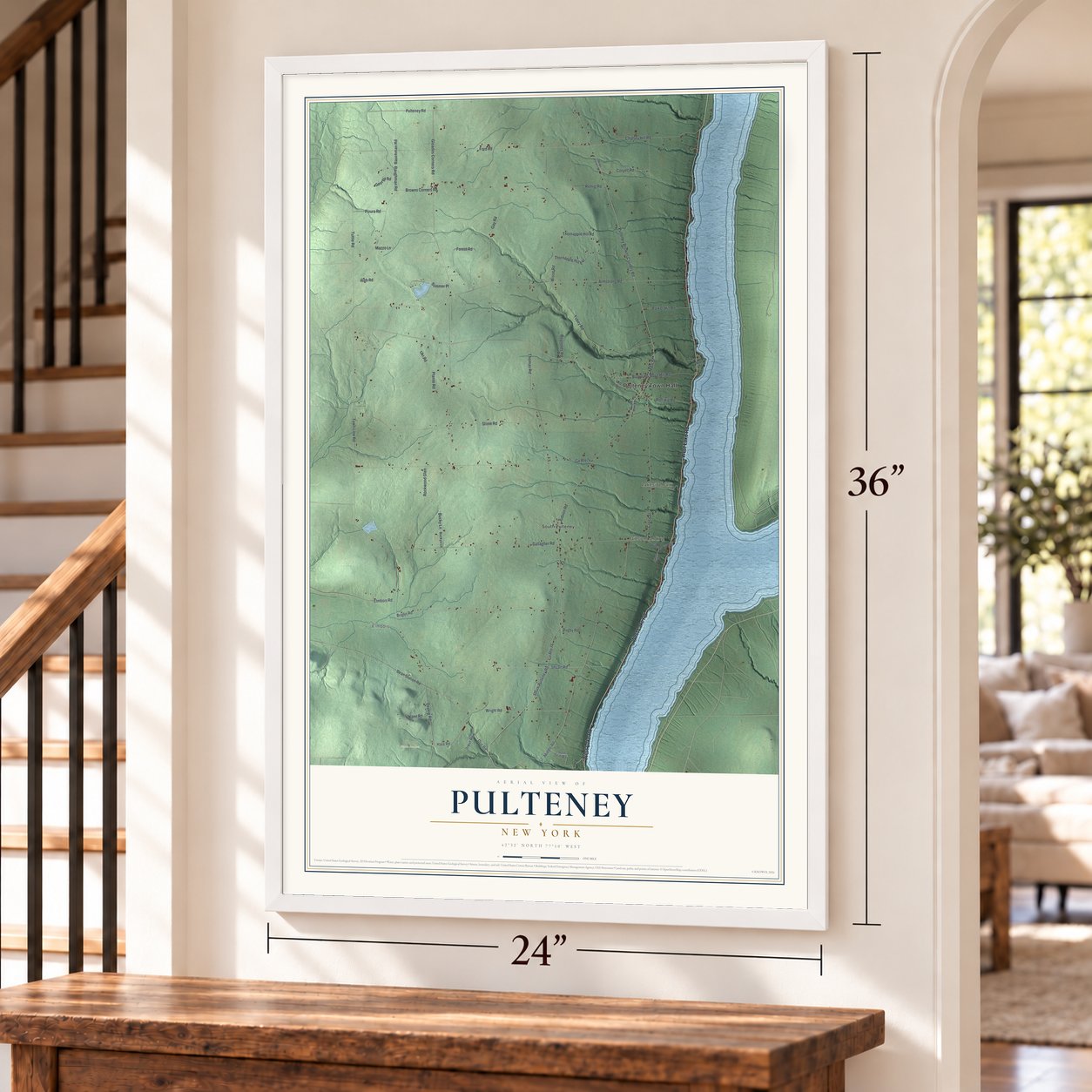Pulteney, New York map, 24 x 36 inch print in a white frame by a staircase