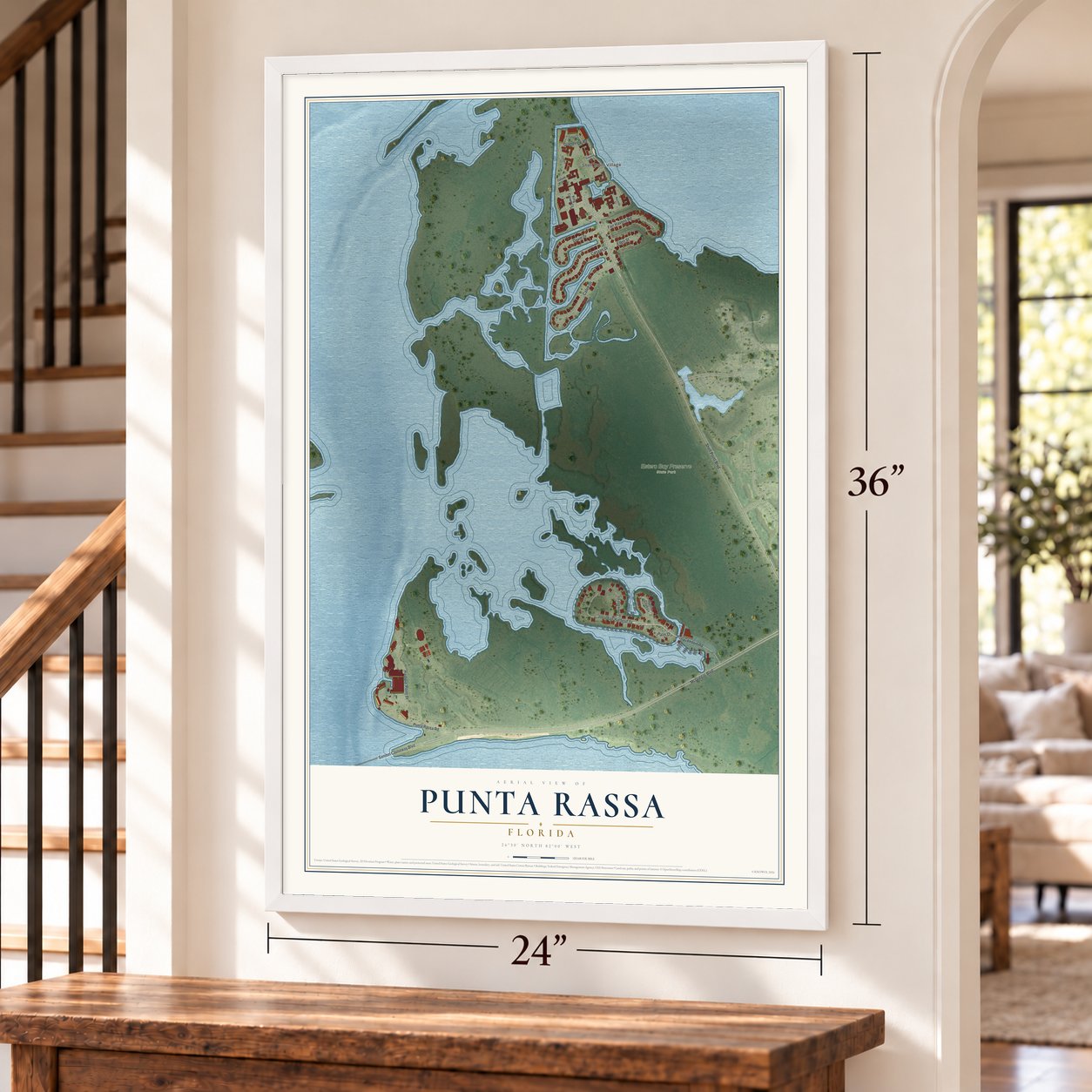 Punta Rassa, Florida map, 24 x 36 inch print in a white frame by a staircase