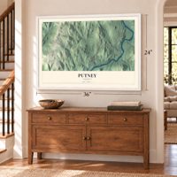 Putney, Vermont map, 24 x 36 inch print in a white frame above a dresser by a staircase