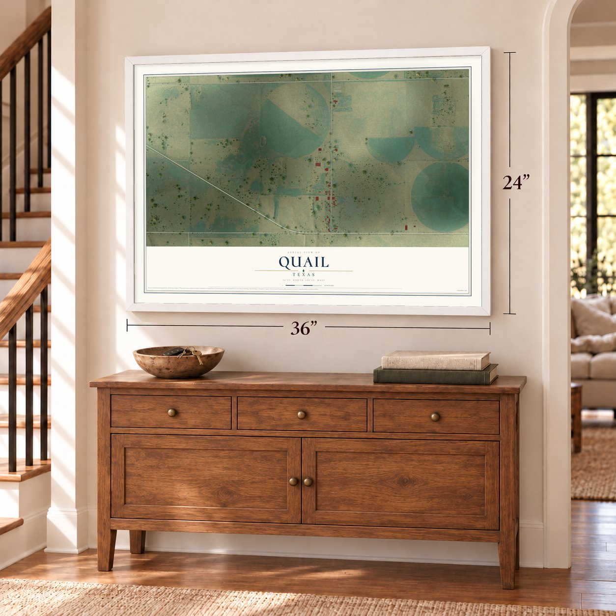 Quail, Texas map, 24 x 36 inch print in a white frame above a dresser by a staircase