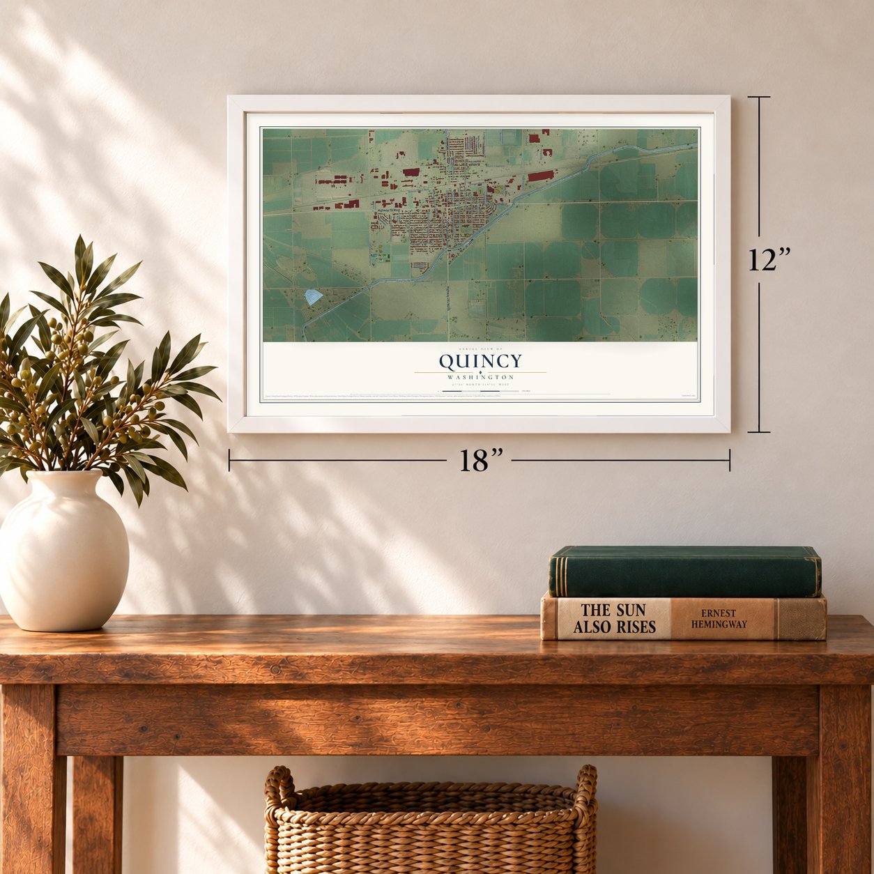 Quincy, Washington map, 12 x 18 inch print in a white frame in an entryway