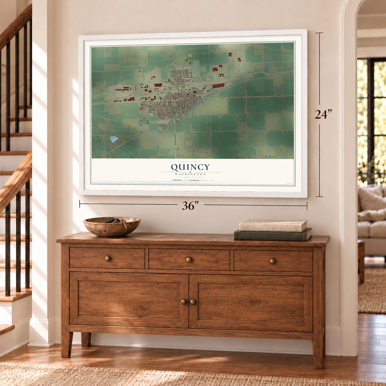 Quincy, Washington map, 24 x 36 inch print in a white frame above a dresser by a staircase