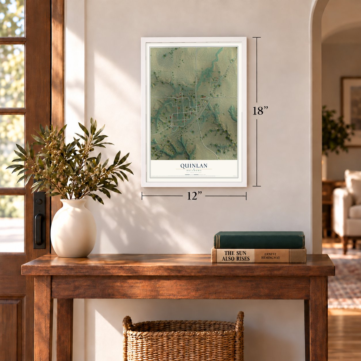 Quinlan, Oklahoma map, 12 x 18 inch print in a white frame in an entryway