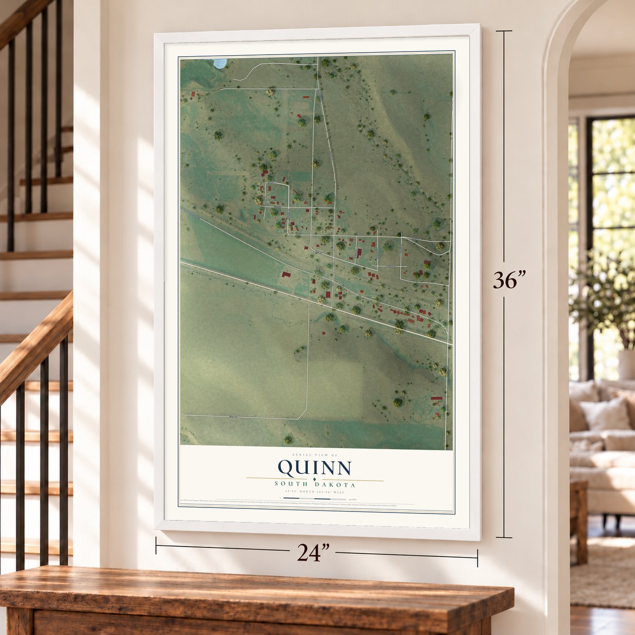 Quinn, South Dakota map, 24 x 36 inch print in a white frame by a staircase