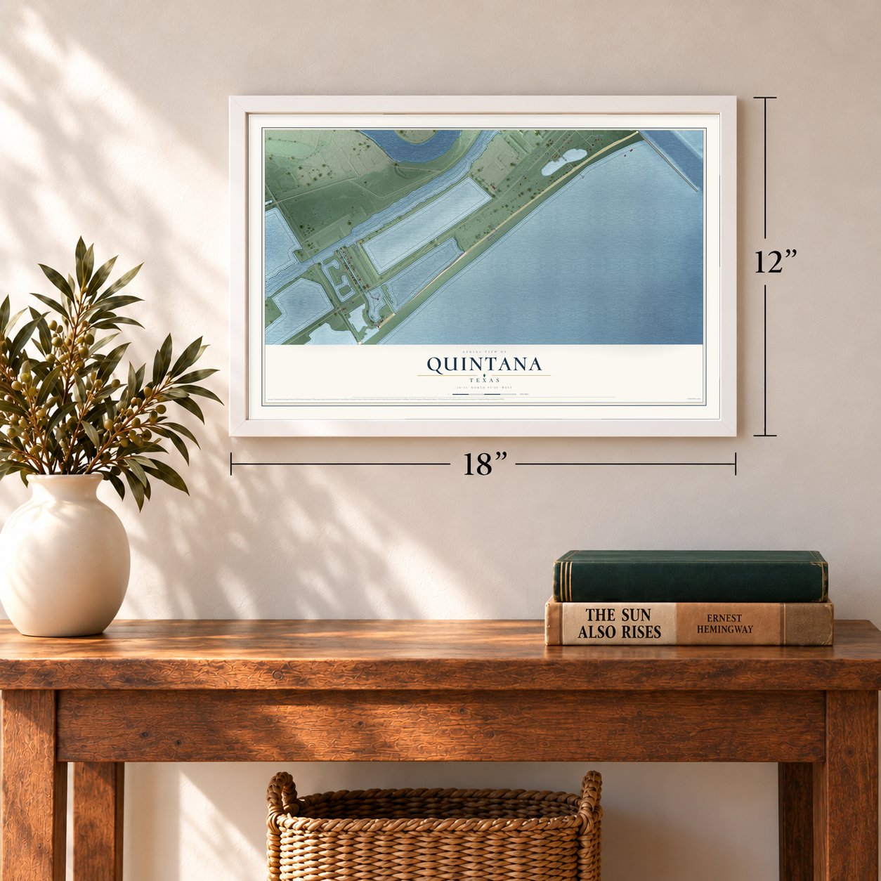 Quintana, Texas map, 12 x 18 inch print in a white frame in an entryway