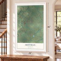 Quitman, Arkansas map, 24 x 36 inch print in a white frame by a staircase