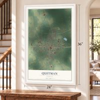 Quitman, Georgia map, 24 x 36 inch print in a white frame by a staircase