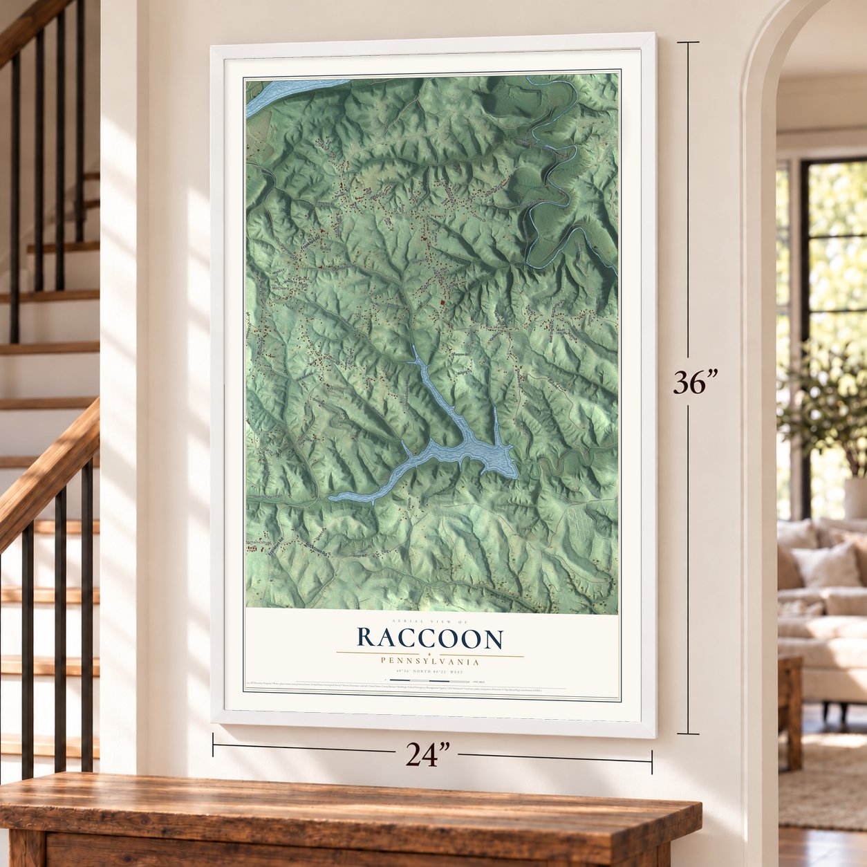 Raccoon, Pennsylvania map, 24 x 36 inch print in a white frame by a staircase