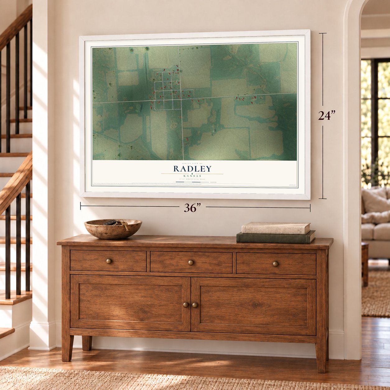 Radley, Kansas map, 24 x 36 inch print in a white frame above a dresser by a staircase