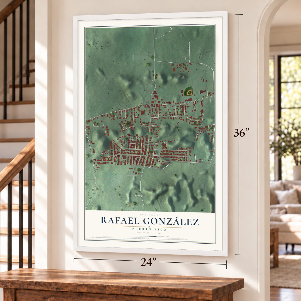 Rafael González, Puerto Rico map, 24 x 36 inch print in a white frame by a staircase