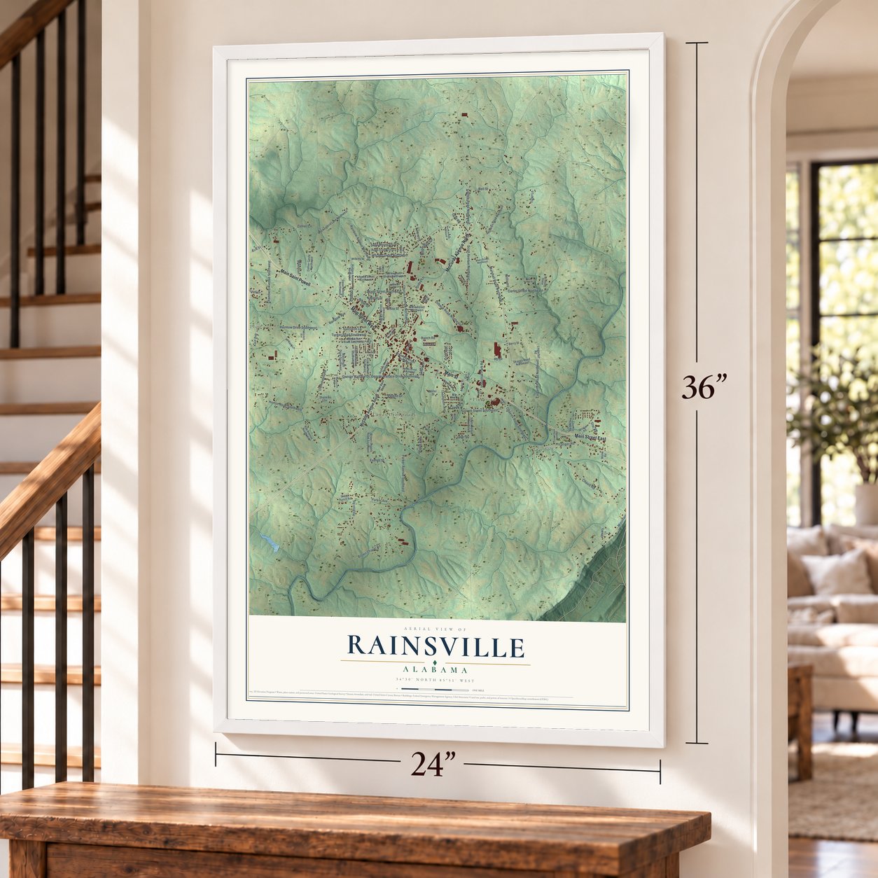 Rainsville, Alabama map, 24 x 36 inch print in a white frame by a staircase