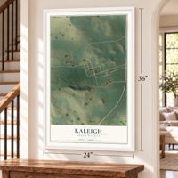 Raleigh, North Dakota map, 24 x 36 inch print in a white frame by a staircase