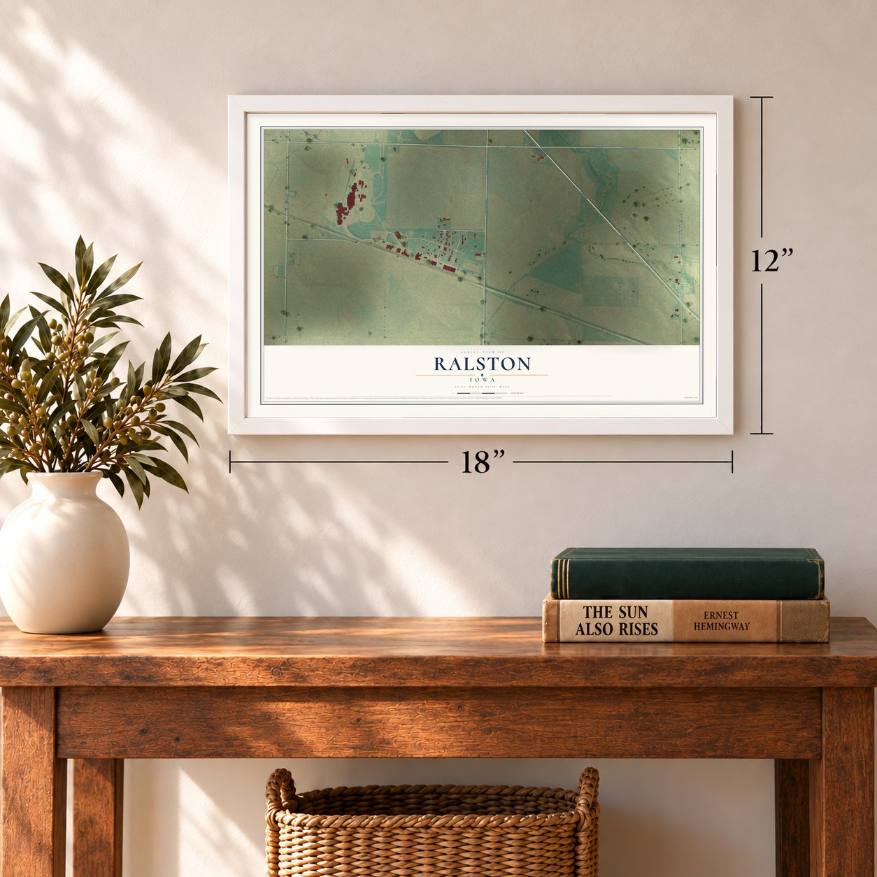 Ralston, Iowa map, 12 x 18 inch print in a white frame in an entryway
