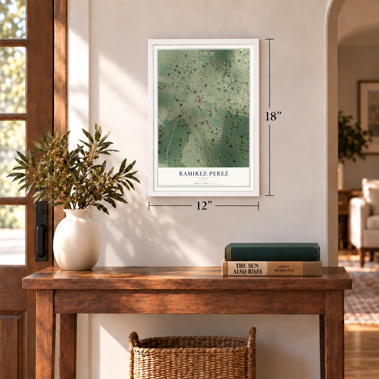 Ramirez-Perez, Texas map, 12 x 18 inch print in a white frame in an entryway