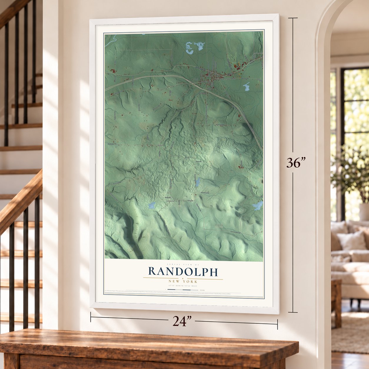 Randolph, New York map, 24 x 36 inch print in a white frame by a staircase