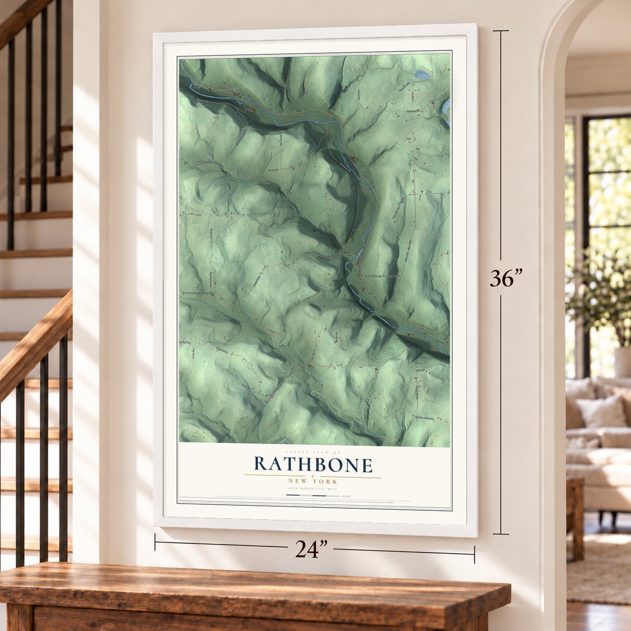 Rathbone, New York map, 24 x 36 inch print in a white frame by a staircase