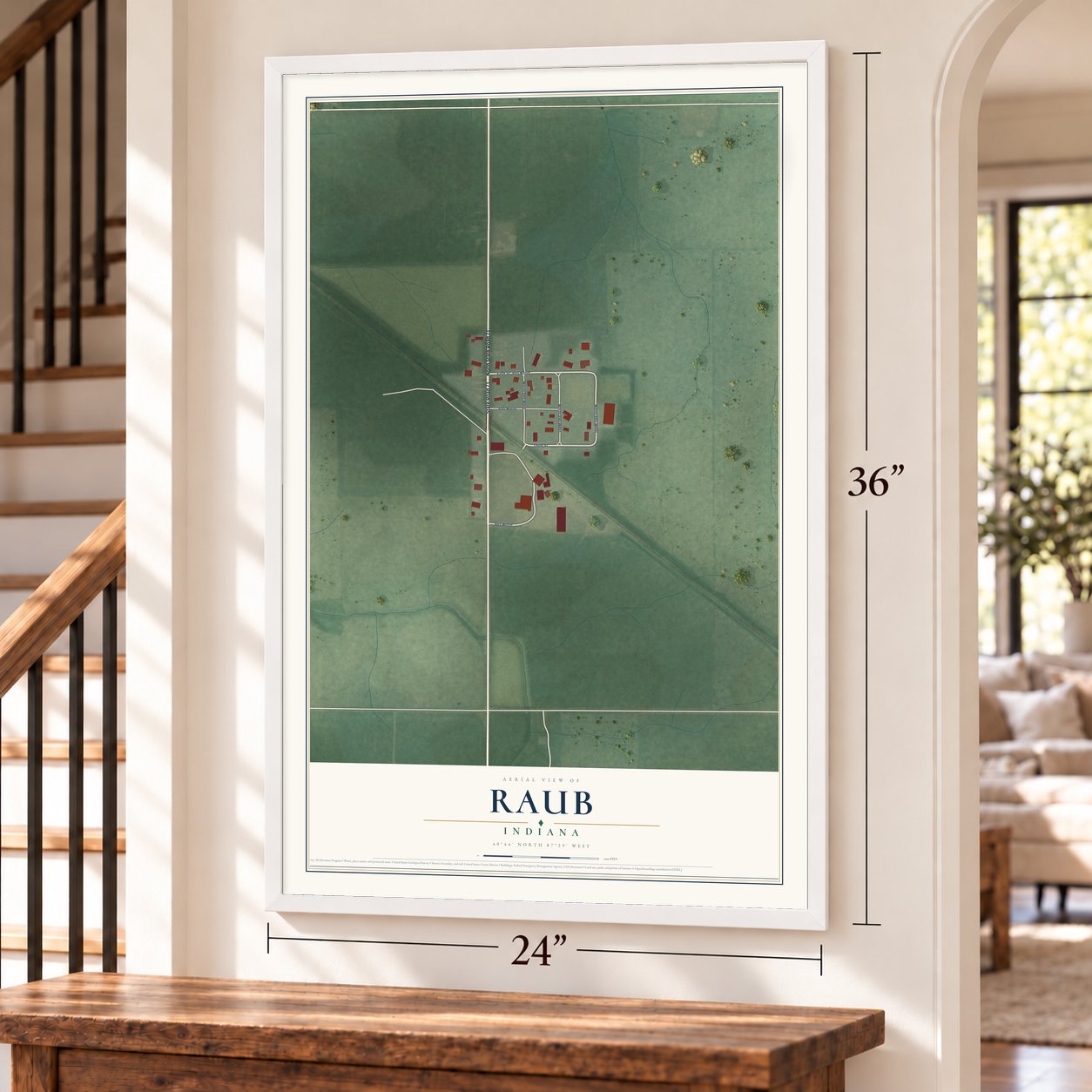 Raub, Indiana map, 24 x 36 inch print in a white frame by a staircase