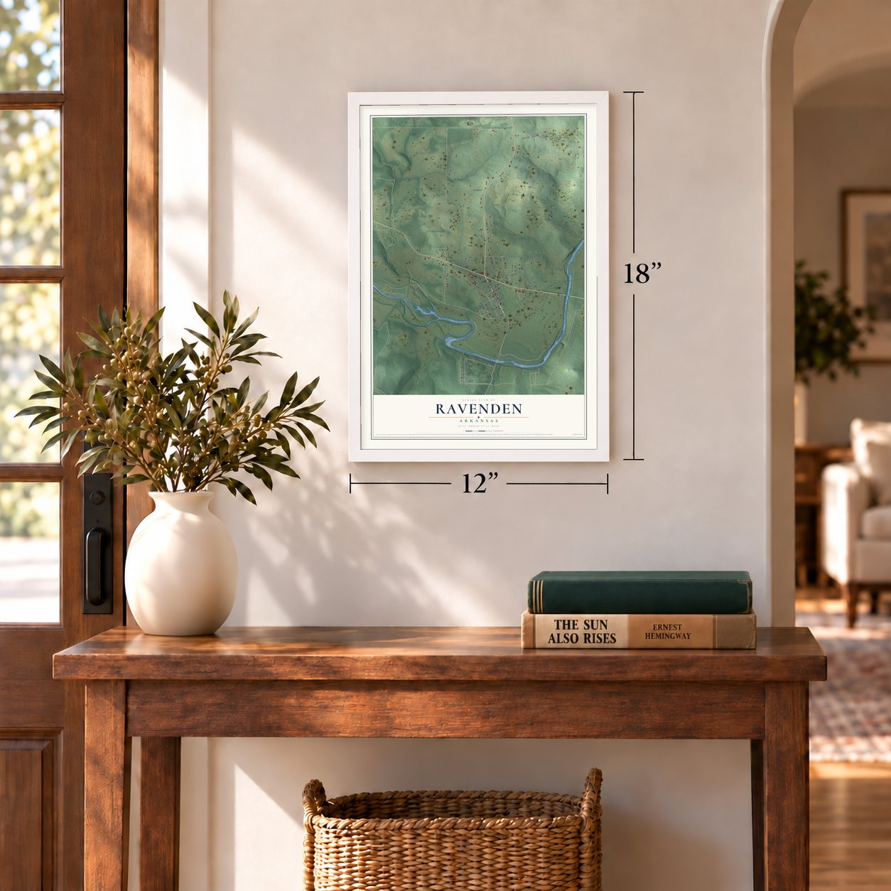 Ravenden, Arkansas map, 12 x 18 inch print in a white frame in an entryway