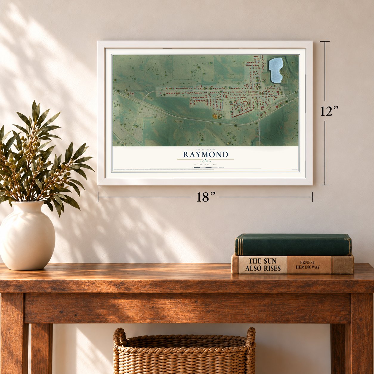 Raymond, Iowa map, 12 x 18 inch print in a white frame in an entryway