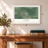 Raymond, Mississippi map, 12 x 18 inch print in a white frame in an entryway